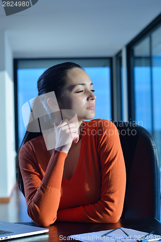 Image of relaxed young woman at home