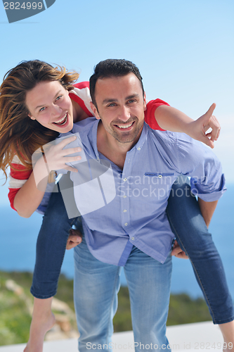 Image of happy young romantic couple have fun relax