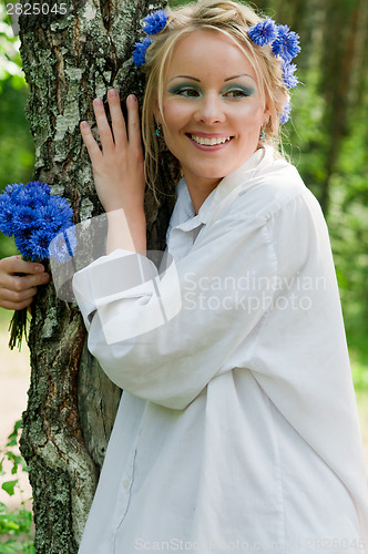 Image of Beautiful young woman in white