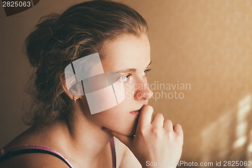 Image of Young Pensive Teen Girl