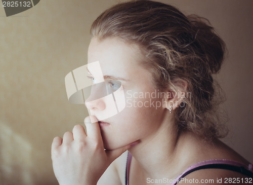 Image of Young Pensive Teen Girl