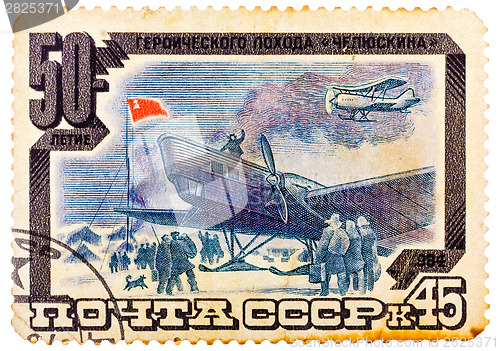 Image of Stamp printed in USSR (Russia) shows plane, rescue crew with ins