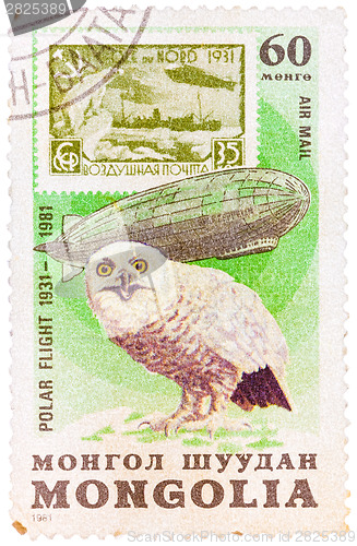 Image of Stamp printed in MONGOLIA shows image of a snowy owl, from the s