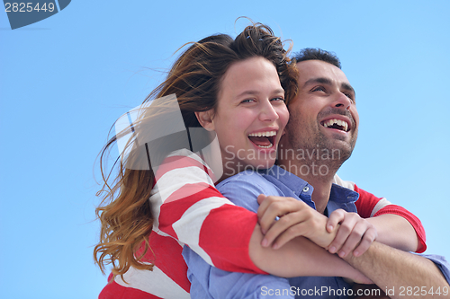 Image of happy young romantic couple have fun relax