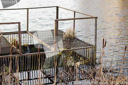 Image of iron dam in river  