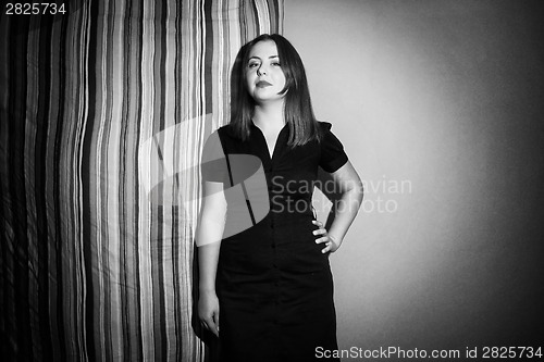 Image of Young woman posing with linen black and white