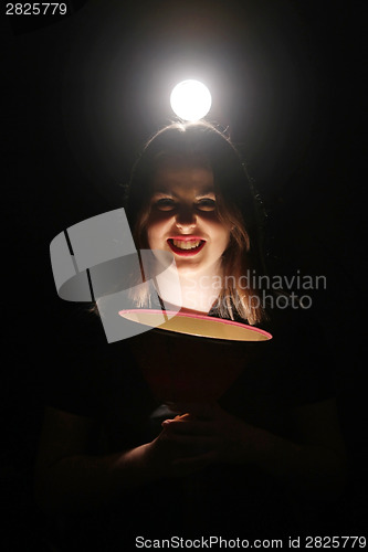 Image of Woman posing with scary face