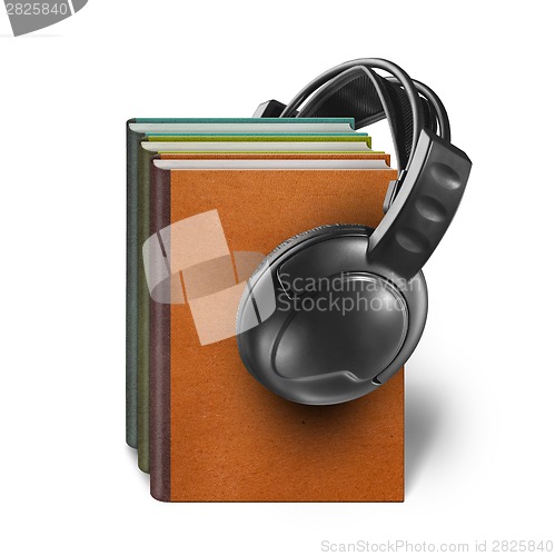 Image of headphones with books isolated on white