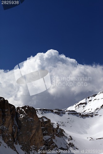 Image of Snowy rocks with snow cornice