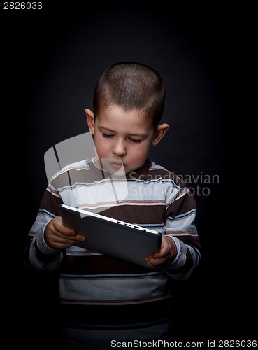 Image of Child using tablet 