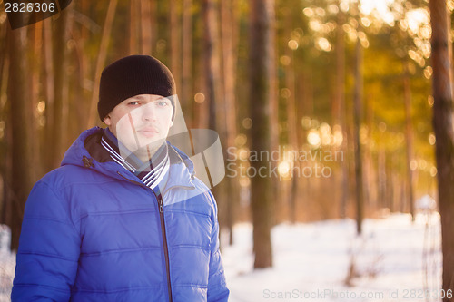 Image of Handsome Man In Winter Forest