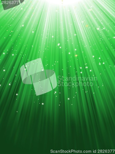 Image of Snow and stars on green luminous rays. EPS 8