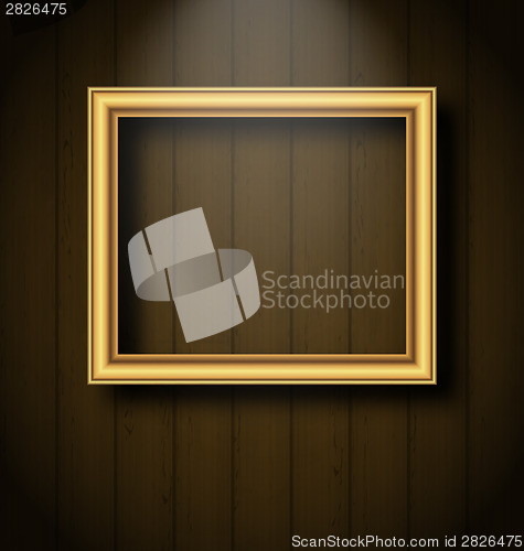 Image of Vintage picture frame on wooden wall