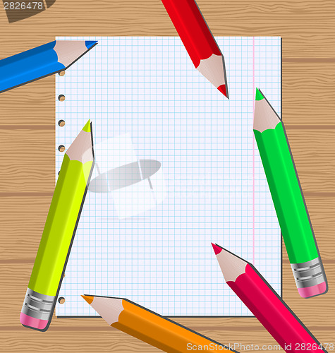 Image of Colorful pencils on paper sheet background