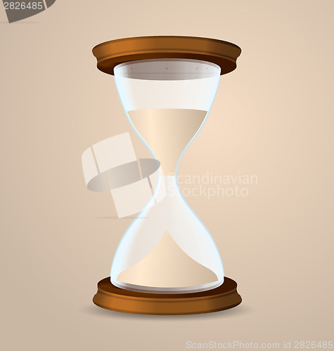 Image of Vintage hourglass isolated on beige background