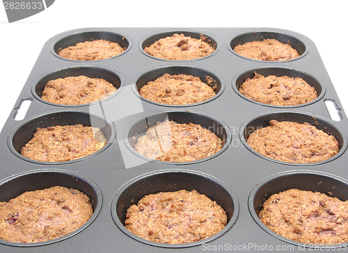 Image of Raspberry muffins in a muffin cake pan 