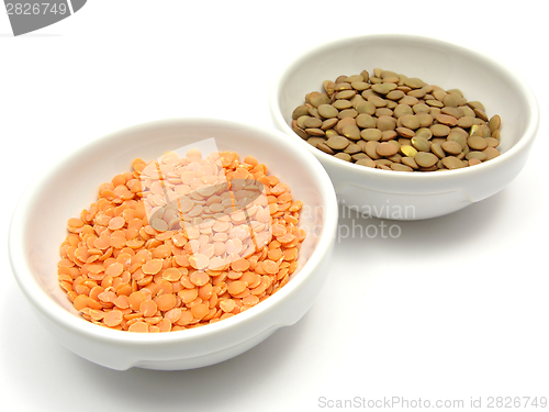 Image of Two bowls of chinaware with lentils and red lentils