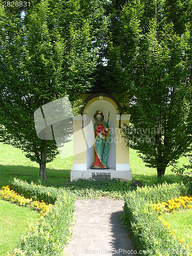 Image of Holy statue as place for praying for christians in Freiland Austria