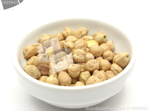 Image of One bowl of ceramic with garbanzos on white