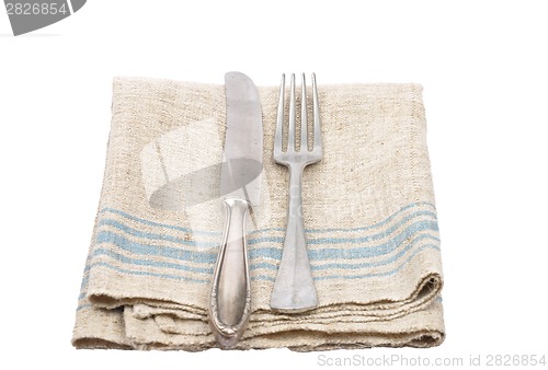 Image of Ancient cutlery on linen