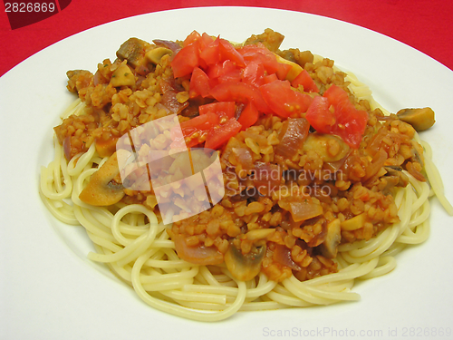 Image of Bulgur wheat groats with noodles and tomatoes