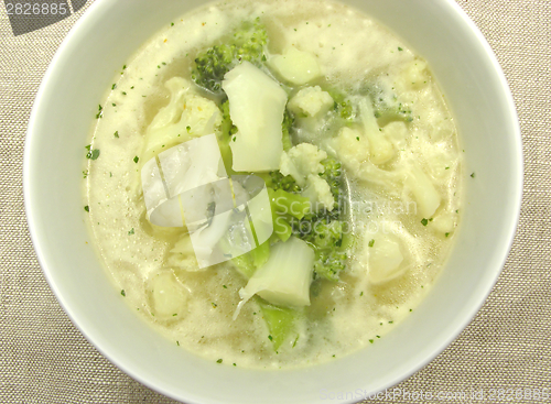 Image of Soup with cauliflower and broccoli in a bowl of chinaware