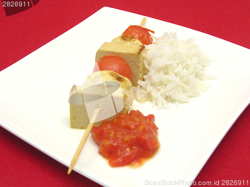 Image of Vegetable spit with bean curd and rice on white plate