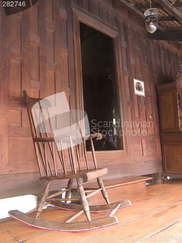 Image of Rocking chair and teak house