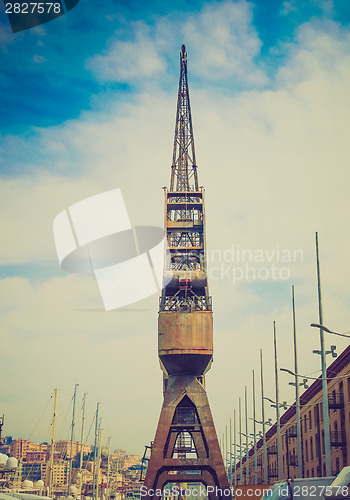 Image of Retro look Old crane at Genoa harbour