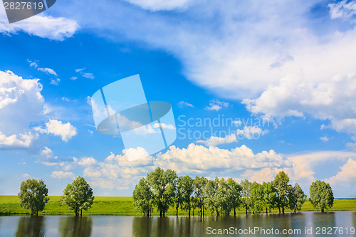 Image of Calm River. Clouds Reflection On Lake