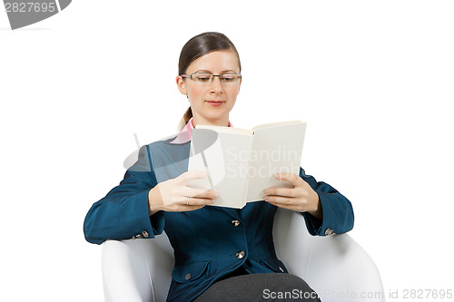 Image of Young woman in glasses with a book