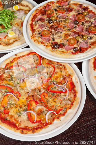 Image of pizza with ham and mushrooms