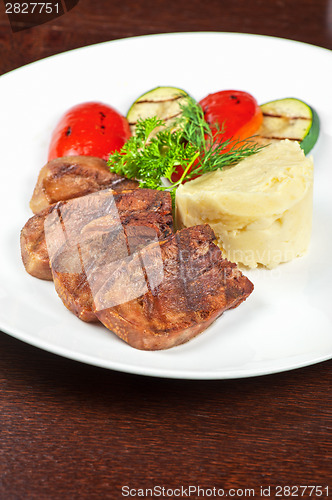 Image of tongue with grilled vegetable