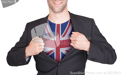 Image of Businessman opening suit to reveal shirt with flag