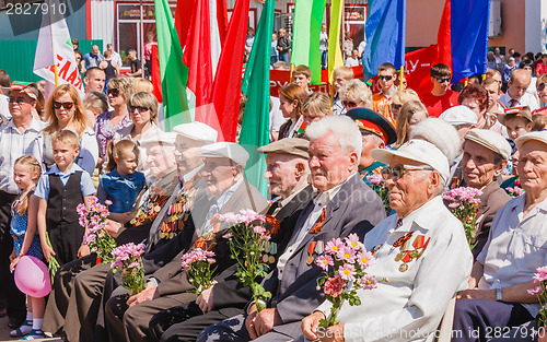 Image of Unidentified veterans listen to congratulations during the celeb