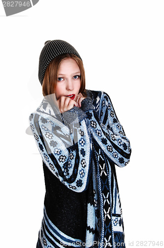 Image of Girl in sweater and hat.