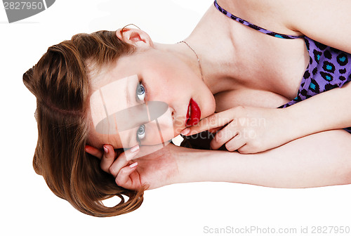 Image of Girl lying on floor.