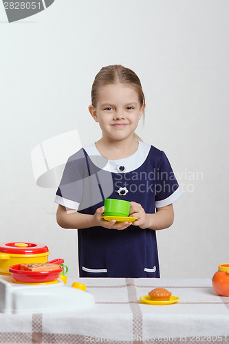 Image of Girl playing in the children's ware