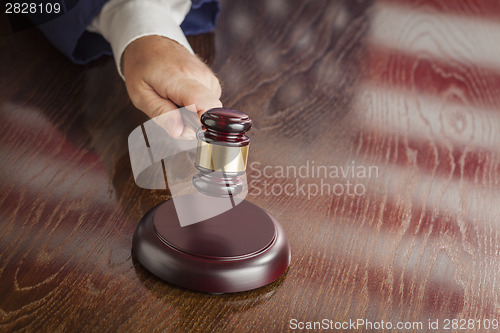 Image of Judge Slams Gavel and American Flag Table Reflection