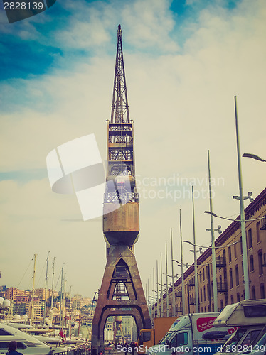 Image of Retro look Old crane at Genoa harbour