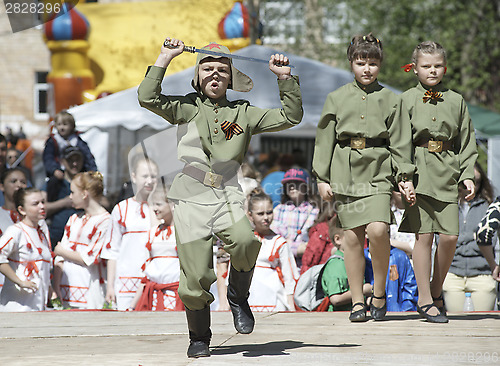 Image of Kid with sword dance