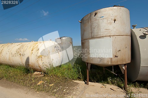 Image of Few metal tank in row