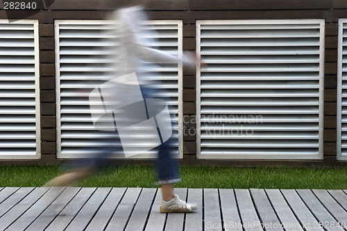 Image of Woman walking