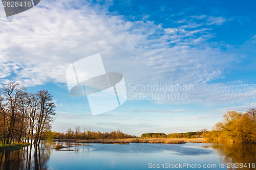 Image of Sky And Clouds Reflection On Lake