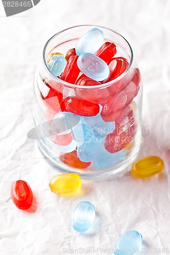 Image of colorful candies in glass jar