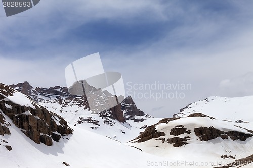 Image of Snow mountains in fog