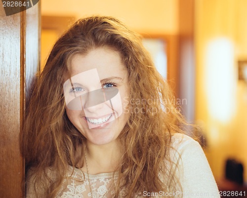 Image of Beautiful girl at home looking very happy