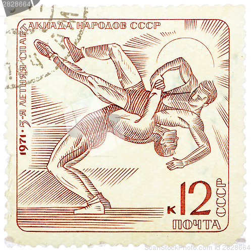 Image of Stamp printed in the USSR (Russia) shows Wrestling with the insc