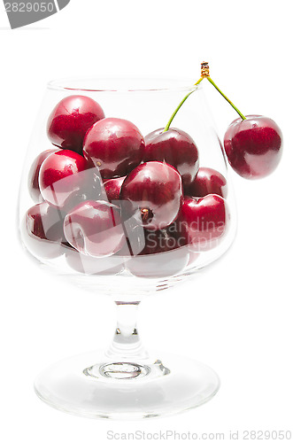 Image of Ripe cherry big berries in wineglass