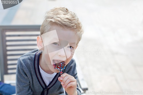 Image of boy with candy